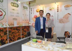 Mr Raymond Ren (left) and Mrs Jing (right) of Gansu Baiheyuan Ecological Agriculture Co., Ltd. The company has a production base in Gansu province. Their main products including sweet lily and potato.
